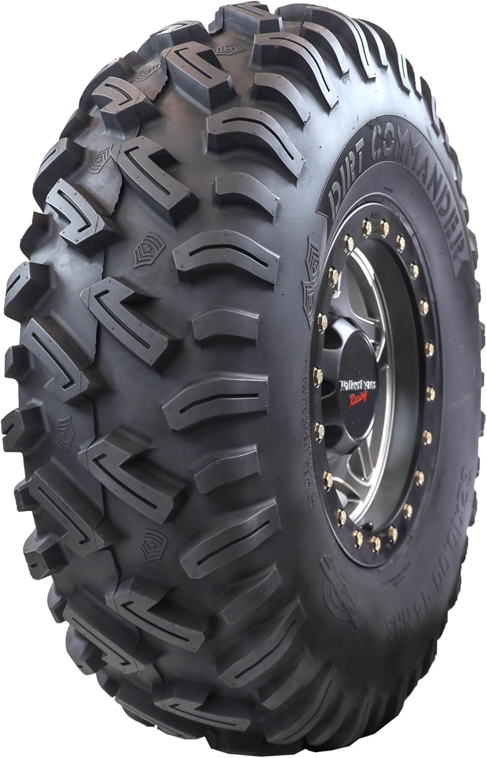 GBC Dirt Commander ATV and UTV tire on a gunmetal beadlock wheel, deep siped tread blocks and DIRT COMMANDER lettering across the sidewall